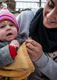 Mutter mit Kind im Irak. Foto: Guillaume Pinon