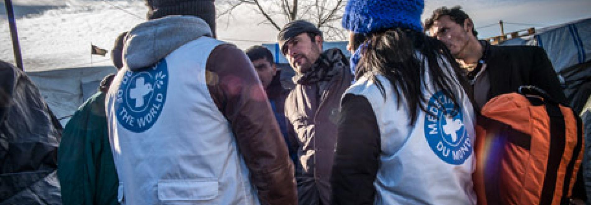 Volunteers meet migrants in Calais ©Olivier Papegnies