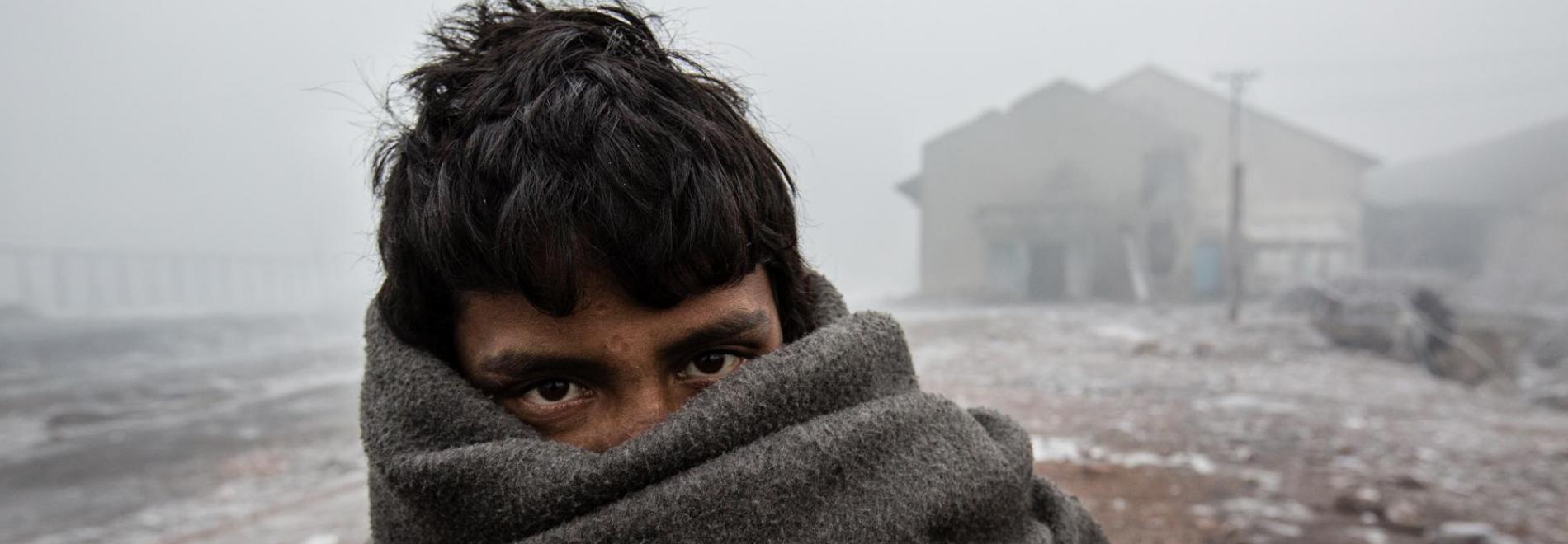 Ein Flüchtling auf dem Balkan. Foto: Kristof Vadino