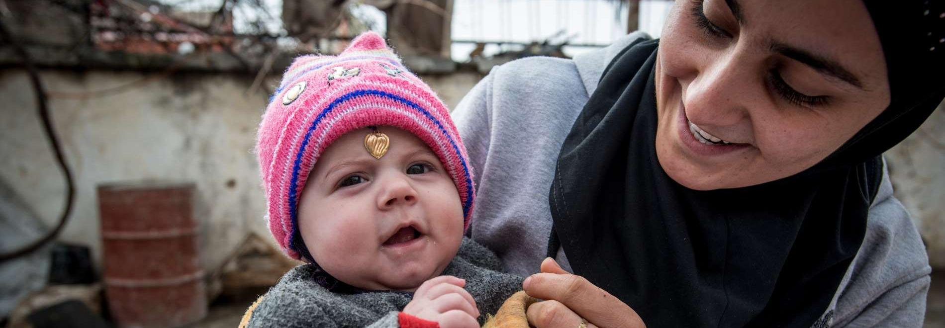 Mutter mit Kind im Irak. Foto: Guillaume Pinon