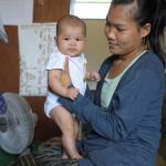 Mutter in Laos mit ihrem Baby. Foto: Lam Duc Hien