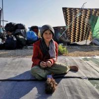 Kind im Flüchtlingscamp auf Lesbos. Foto: Yiannis Yiannakopoulos 