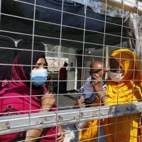 Flüchtlinge in einem Camp in Griechenland. Foto: Yiannis Yiannakopoulos