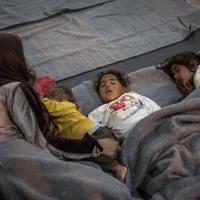 Noch immer sind Flüchtlinge unter schlechten Bedigungen untergebracht. Foto: Olmo Calvo