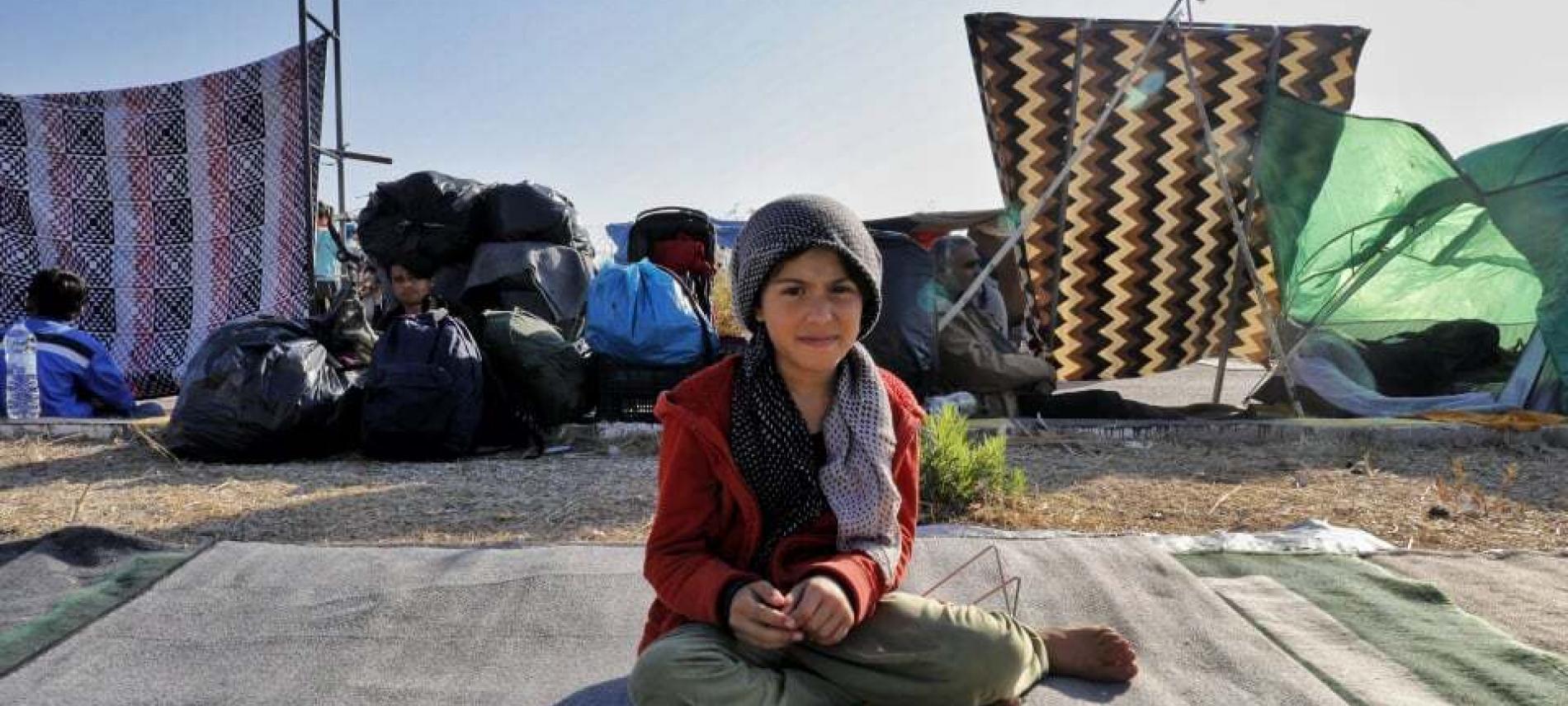Kind im Flüchtlingscamp auf Lesbos. Foto: Yiannis Yiannakopoulos 