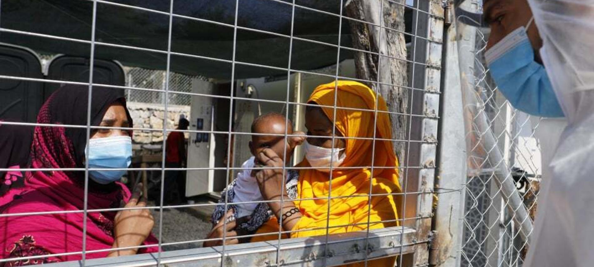 Flüchtlinge in einem Camp in Griechenland. Foto: Yiannis Yiannakopoulos