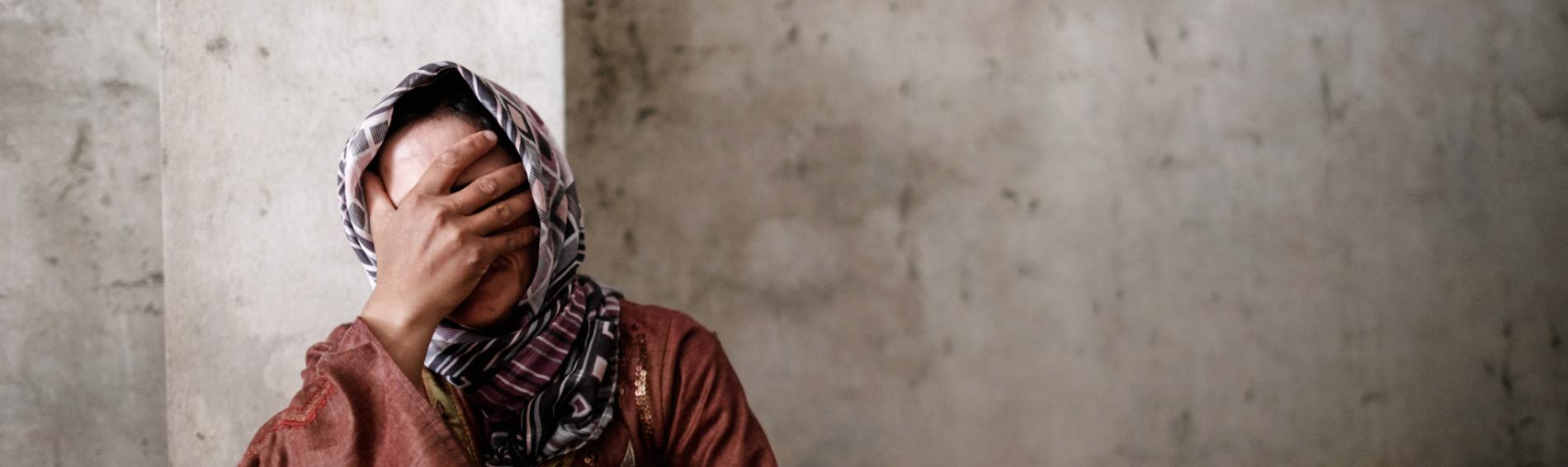 Eine verzweifelte Frau in Syrien. Foto: Ärzte der Welt