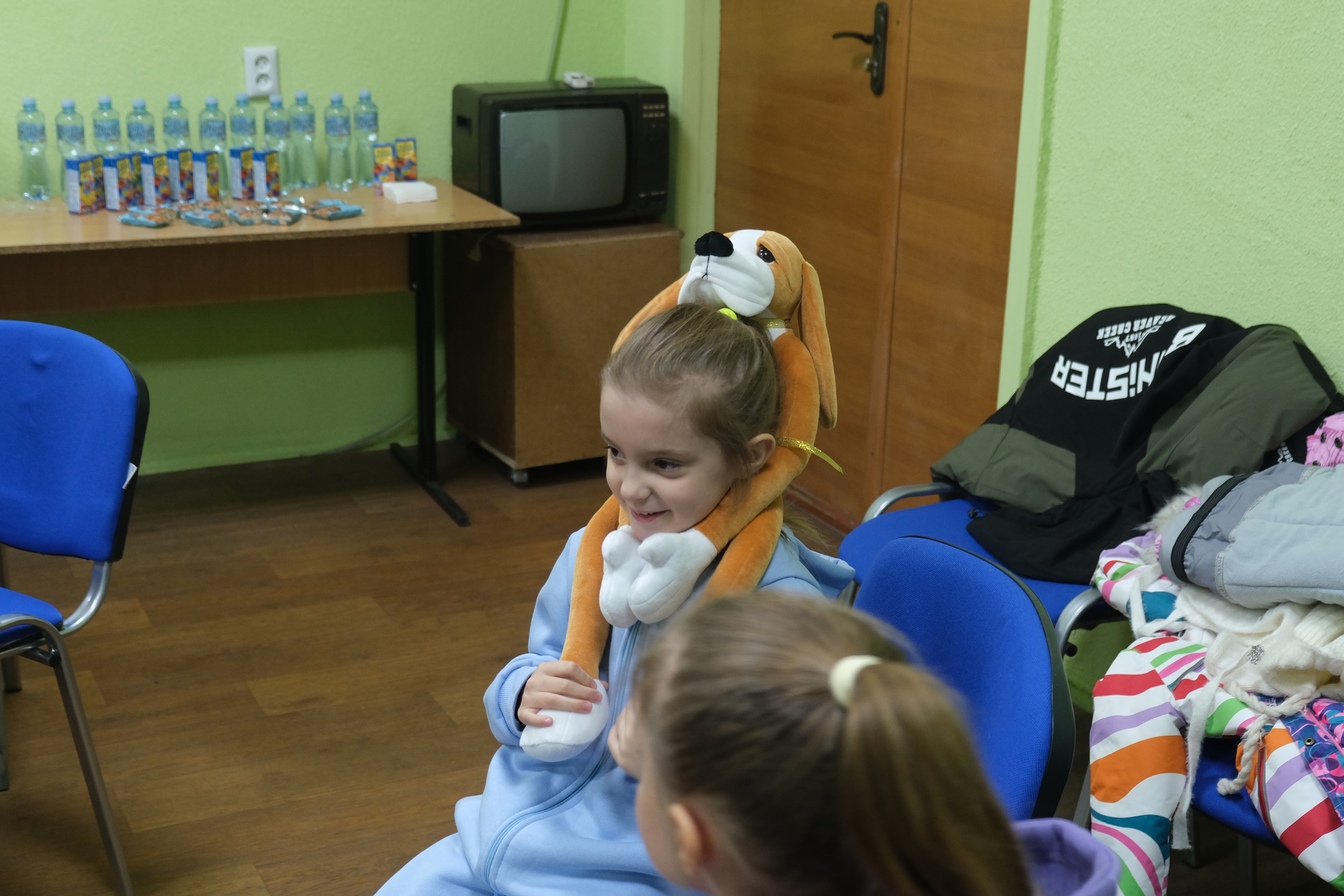 Ein ukrainisches Kind mit seinem Hibuki. Foto: Ärzte der Welt