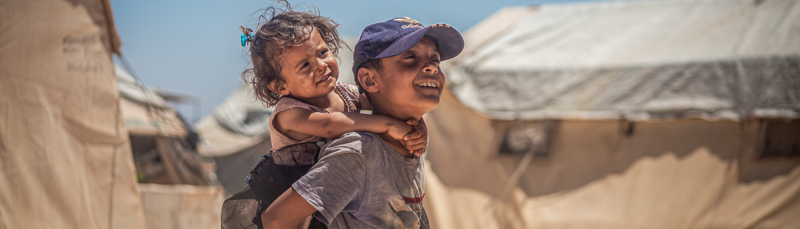 Syrien: Kinder spielen in einem Zeltlager. Ärzte der Welt leistet medizinische Hilfe nach dem Erdbeben in der Türkei und Syrien. © Ärzte der Welt